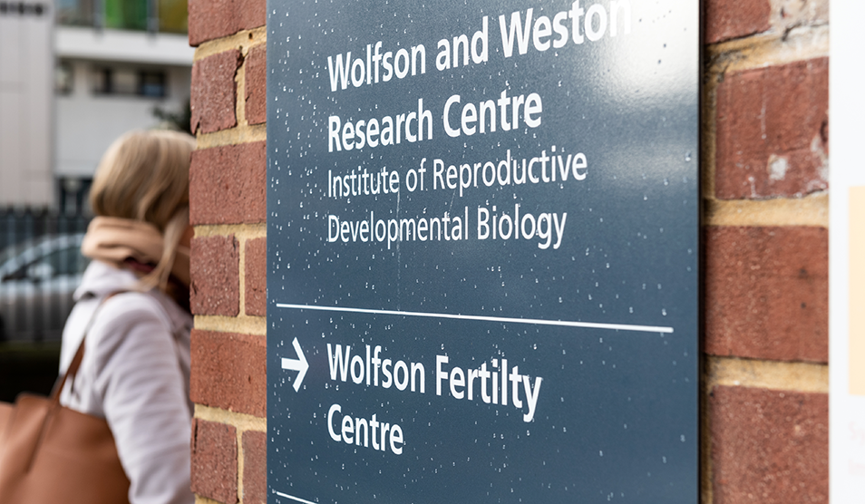 person walking away from fertility centre