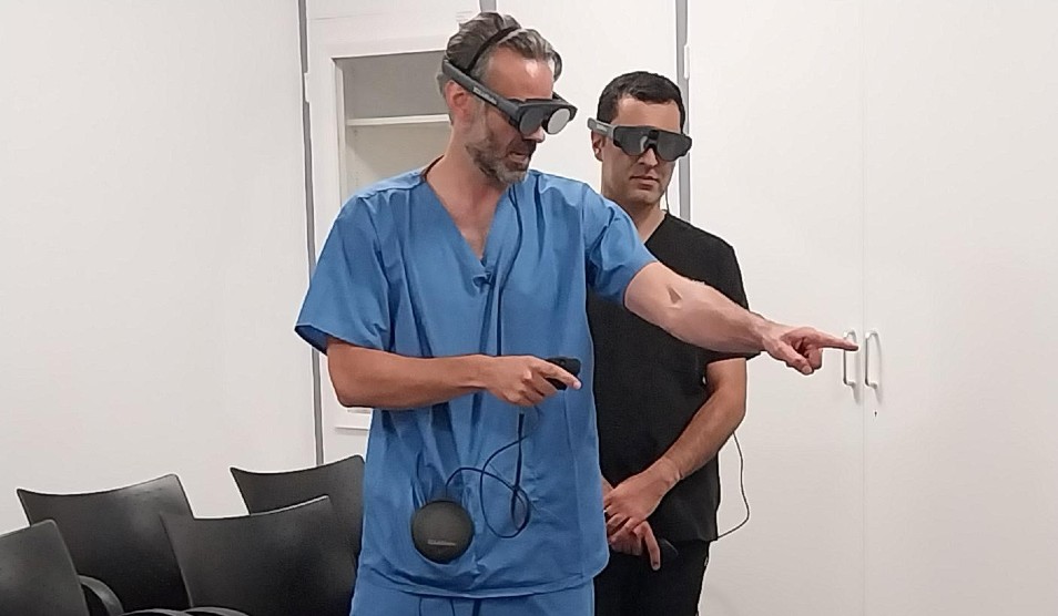 Neurosurgeons demonstrating the technology