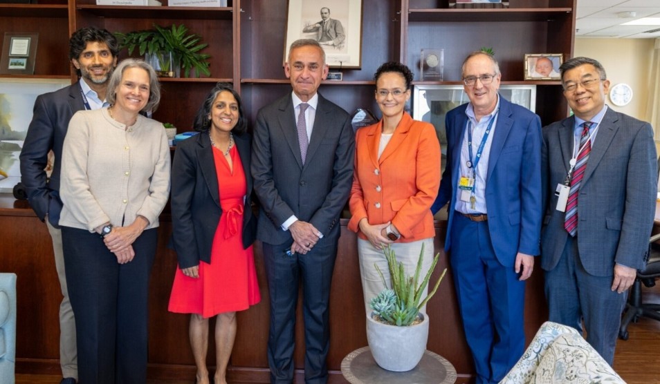 Photo of representatives from the Fleming Initiative and Johns Hopkins University