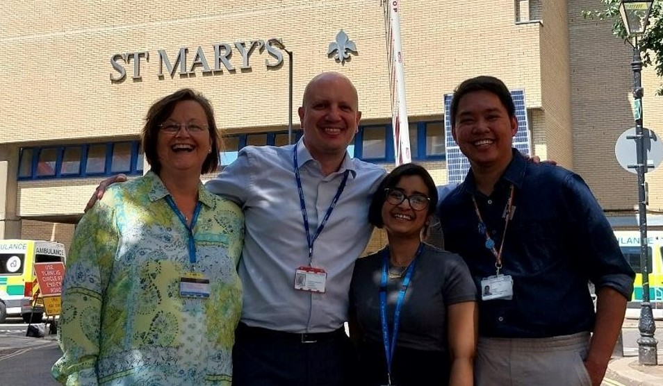 Photo of four members of the Fracture Liaison Team in front of St Mary's Hospital.