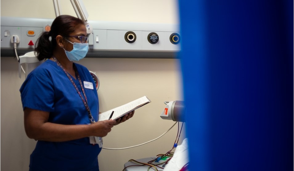 patient speaking to healthcare worker