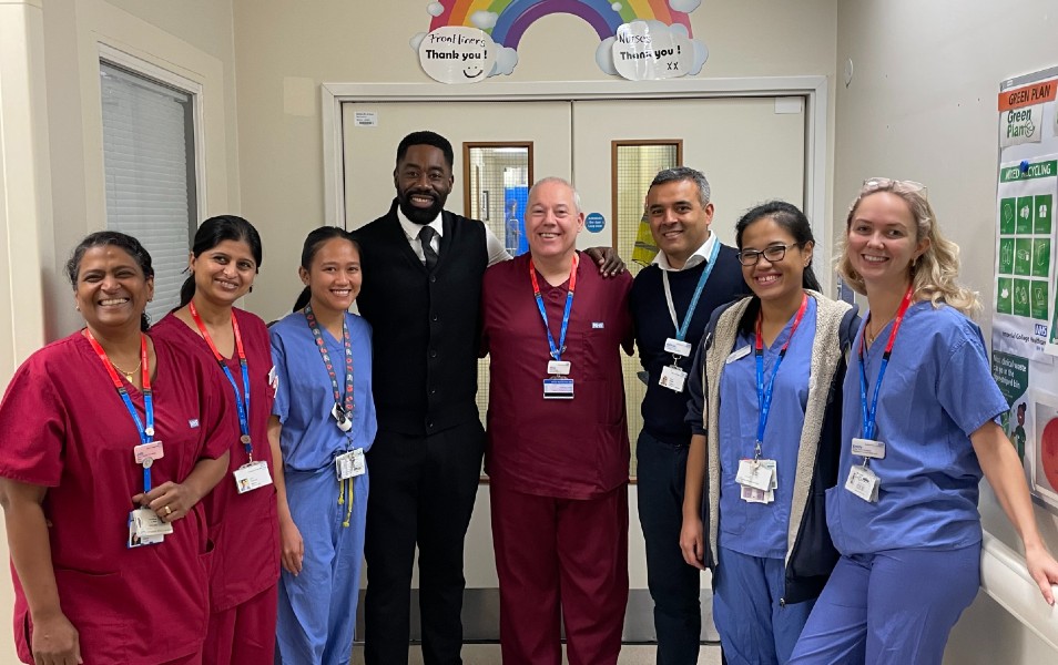 Photo of Matthew and some of the hospital staff who treated and care for him