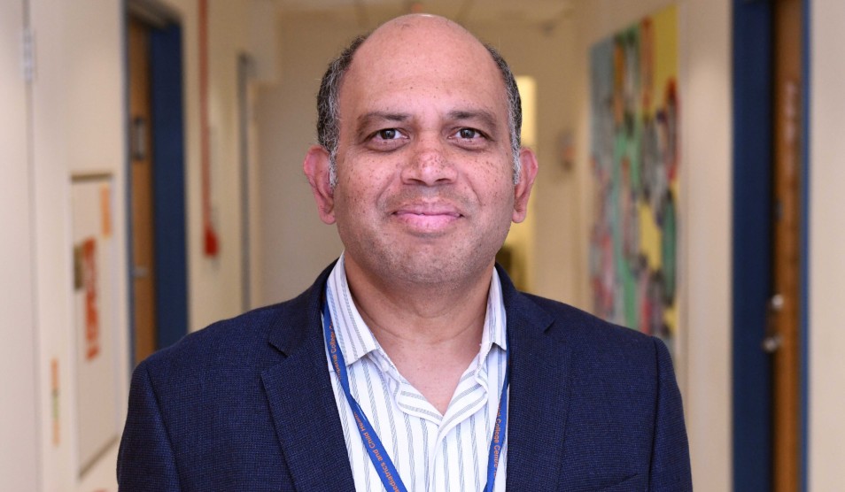 Photo of Padmanabhan Ramnarayan smiling in a blue suit