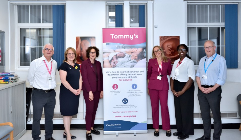 Photo of Baroness Merron with representatives of the Trust, Imperial College London and Tommy's