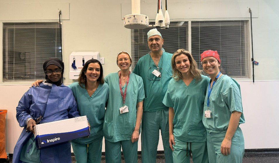 Photo of staff wearing green scrubs who were involved in the HGNS procedure