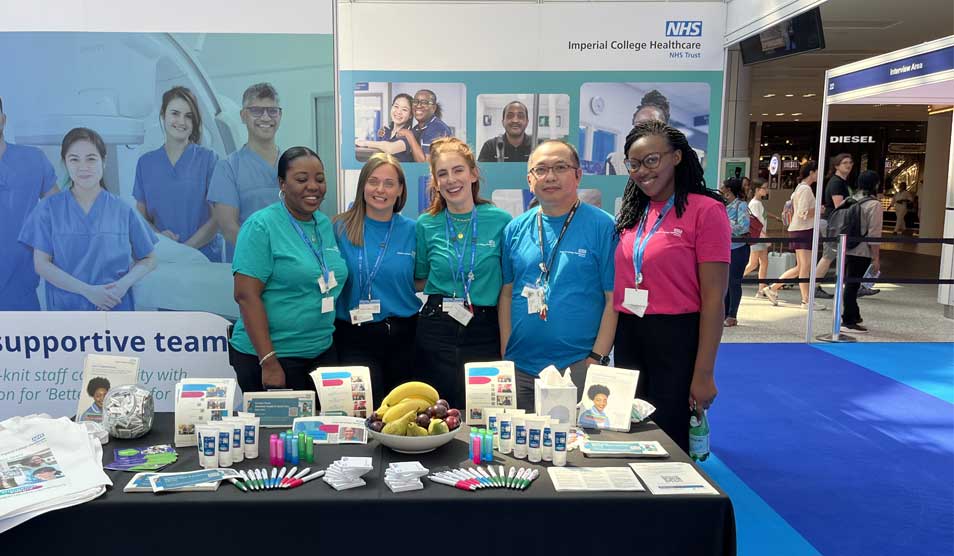 Staff at a careers recruitment fair Staff at a careers recruitment fair