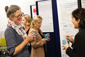 CATO Symposium - two women talking