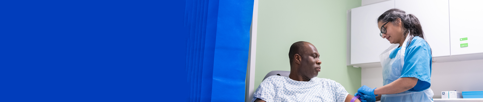 Nurse taking blood pressure