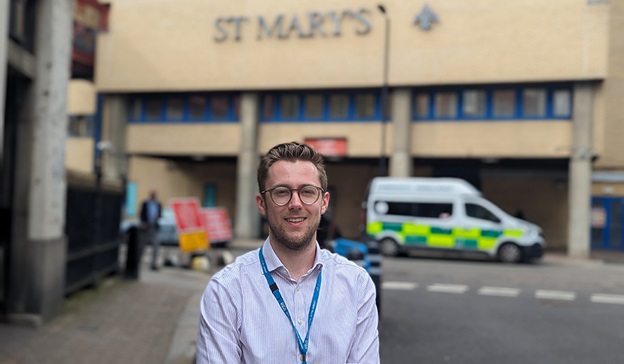 Dr James Harkness next to St Mary's Hospital