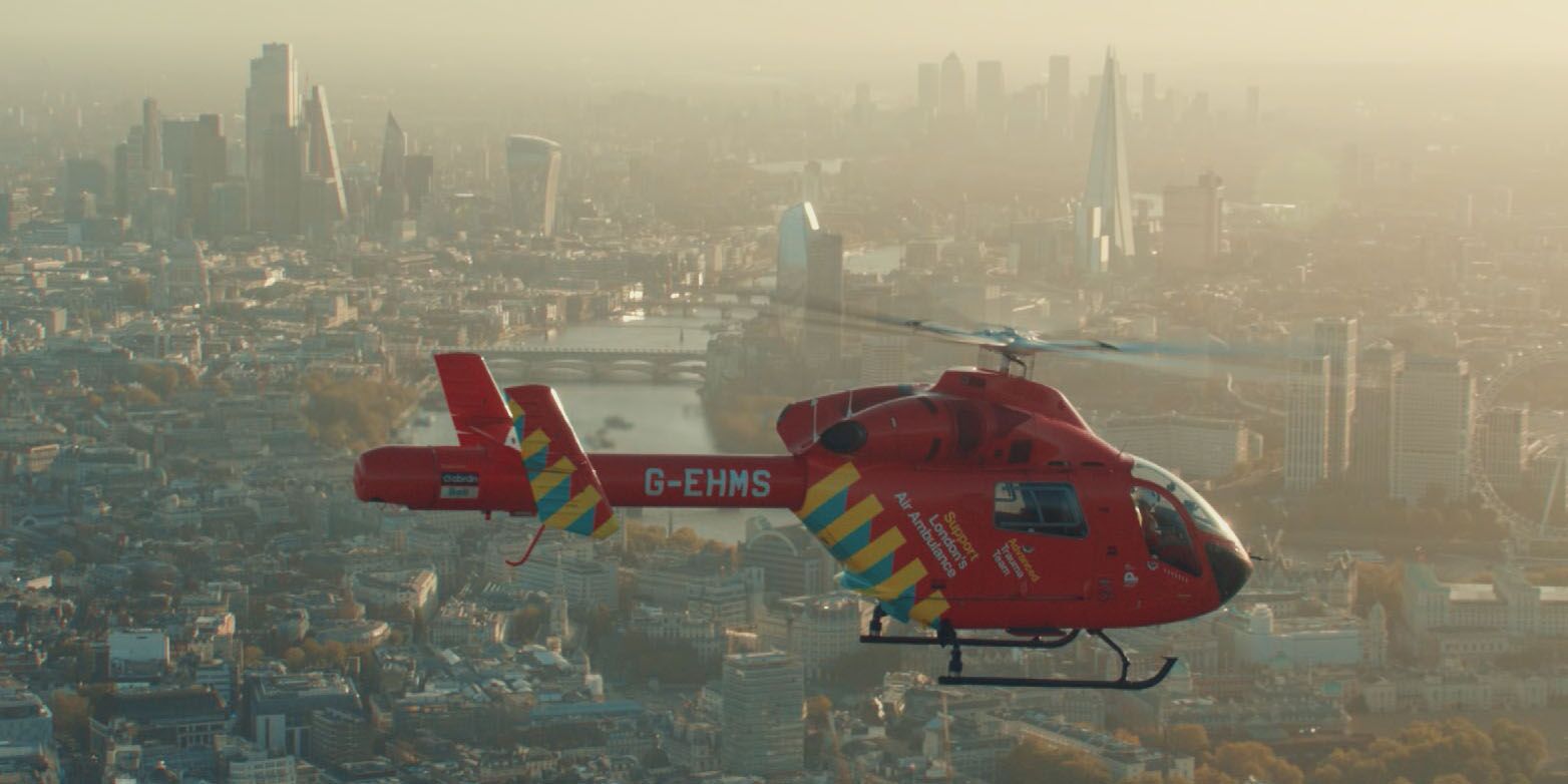 An air ambulance helicopter flies over London