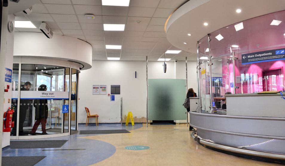 Photograph of the reception desk and foyer of Charing Cross Hospital.