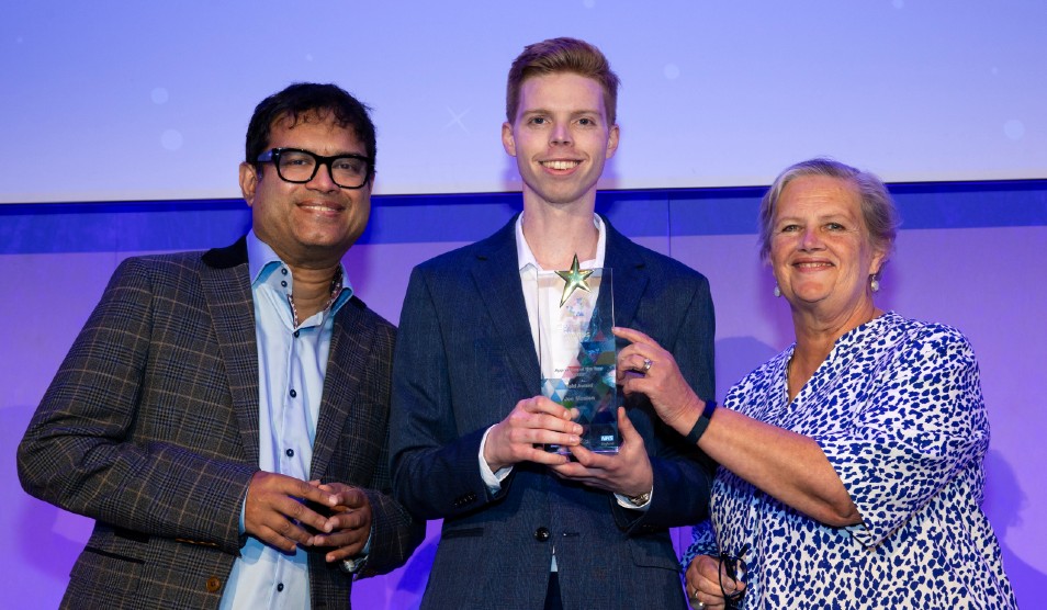 Joe Maslen being presented with award