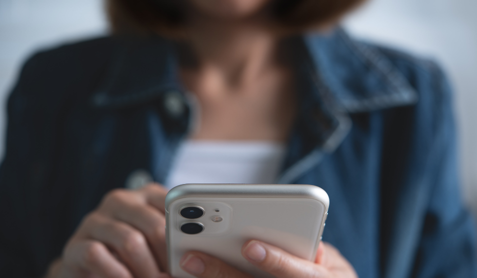 Woman scrolling on her phone