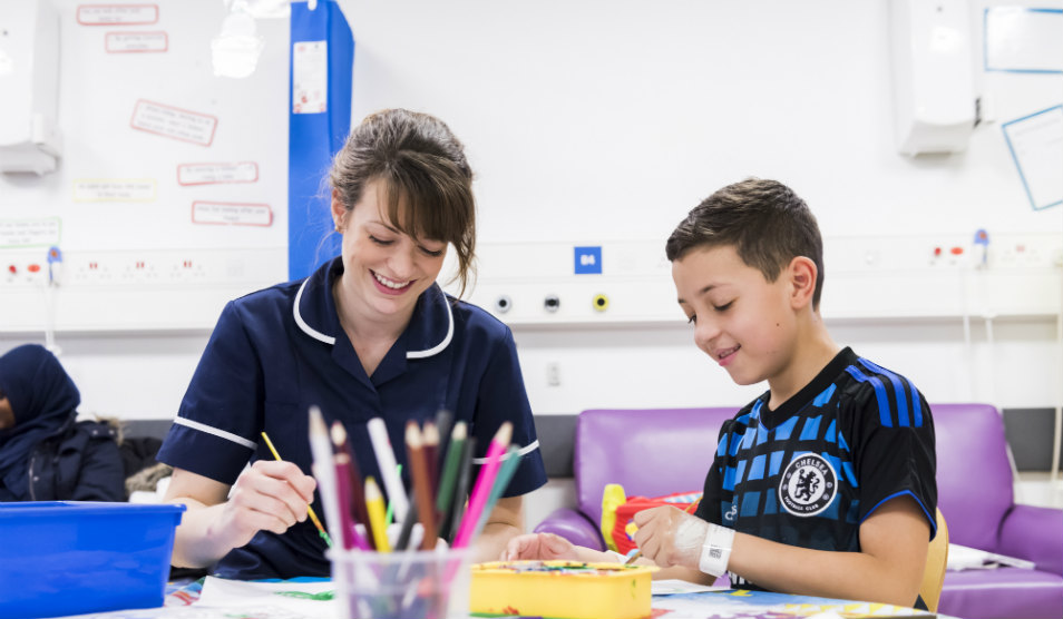 Paediatric nurse and child