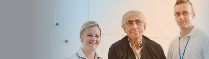 Staff with a patient at Charing Cross Hospital