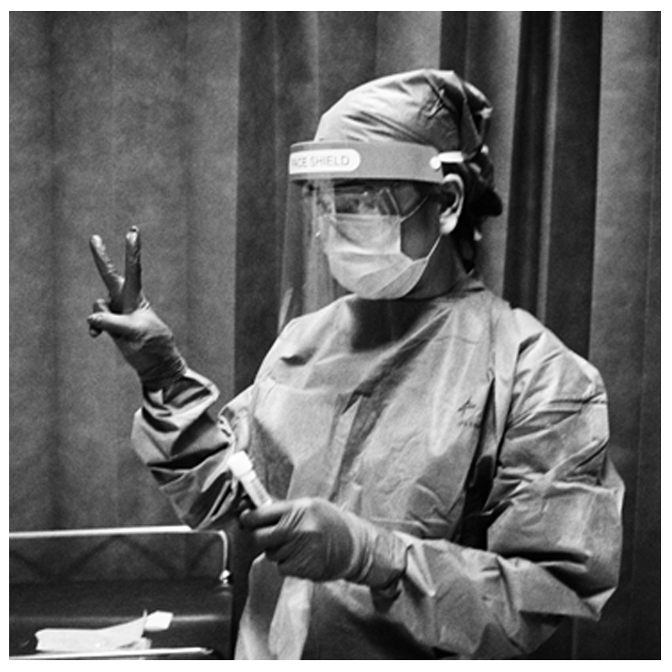 Black and white photo of Clinician in PPE Black and white photo of Clinician in PPE