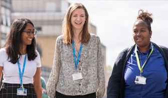 Photo of three female members of Trust staff