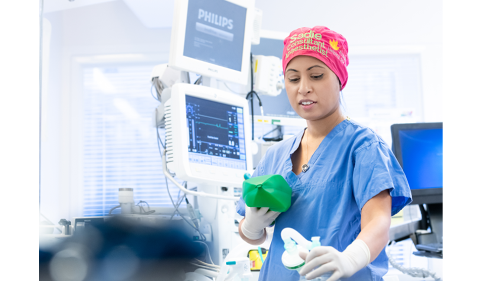 Photo of female anaesthetist in hospital theatre Photo of female anaesthetist in hospital theatre