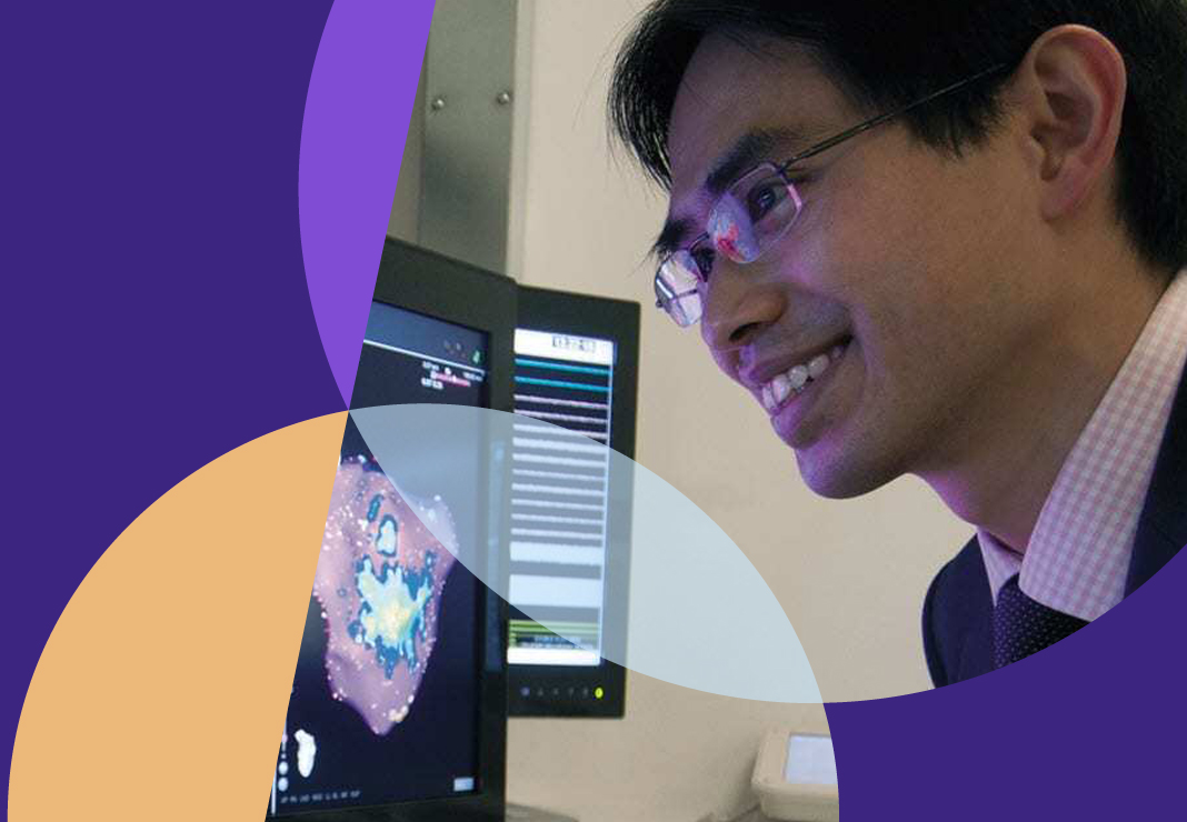 Photo of staff reviewing cardiac scan