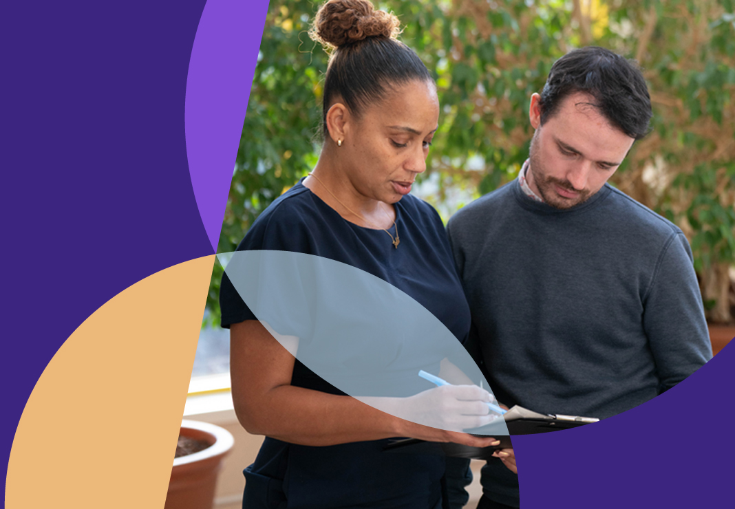 Image of couple looking at paper work