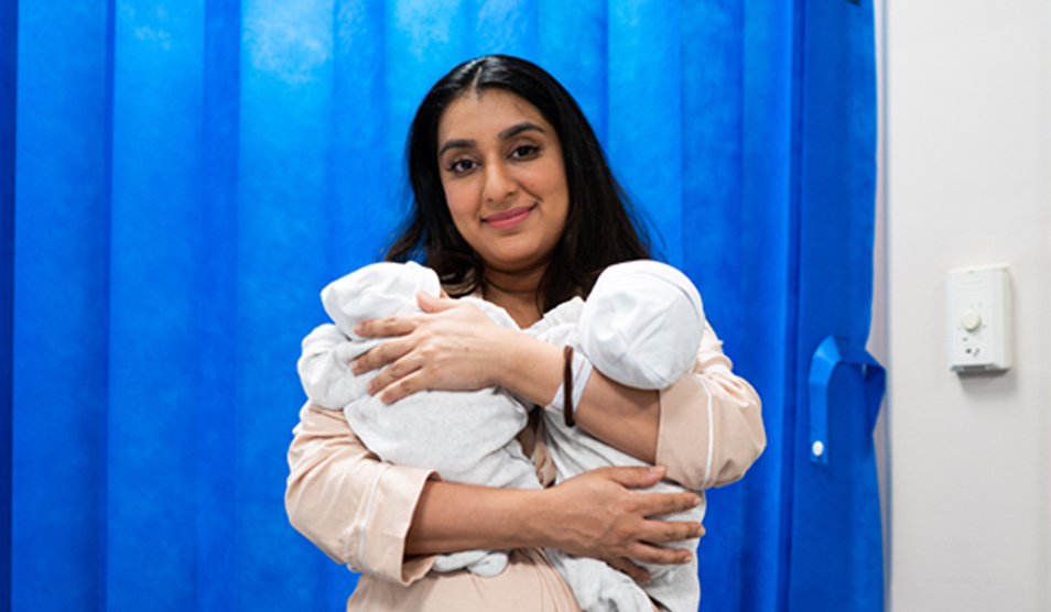 Mother with newborn twins