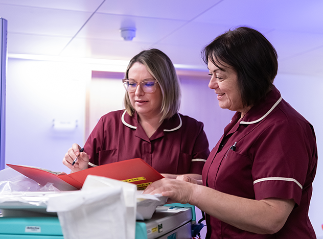 Nurses reading notes