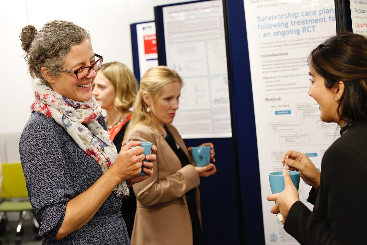CATO Symposium - two women talking